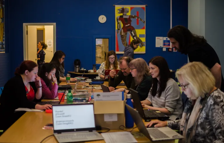 Group of  volunteers documentinng achievements of Scottish women working in archaeology